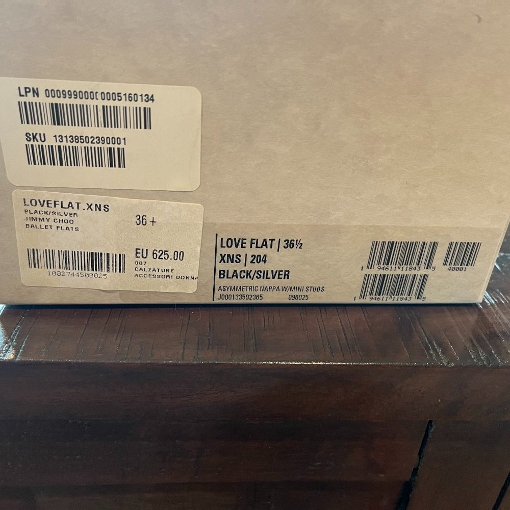 Black Leather with Silver Grommet Jimmy Choo ballet flat